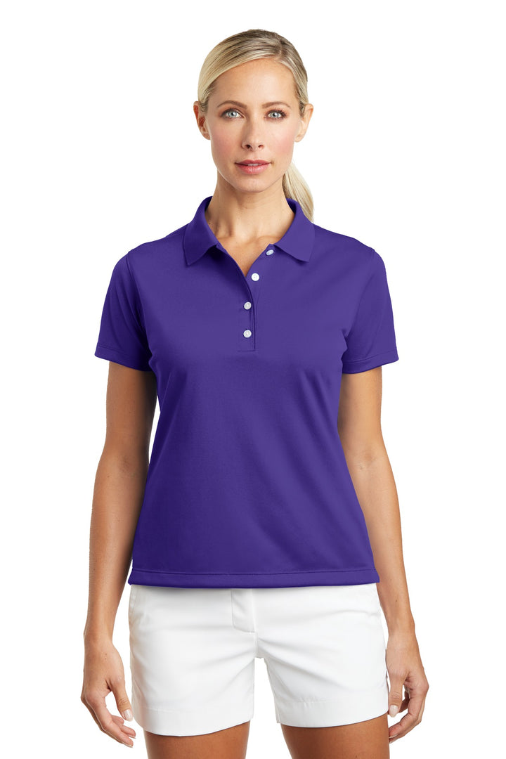 Front View of Varsity Purple Nike Women's Tech Basic Dri-FIT Polo. 203697