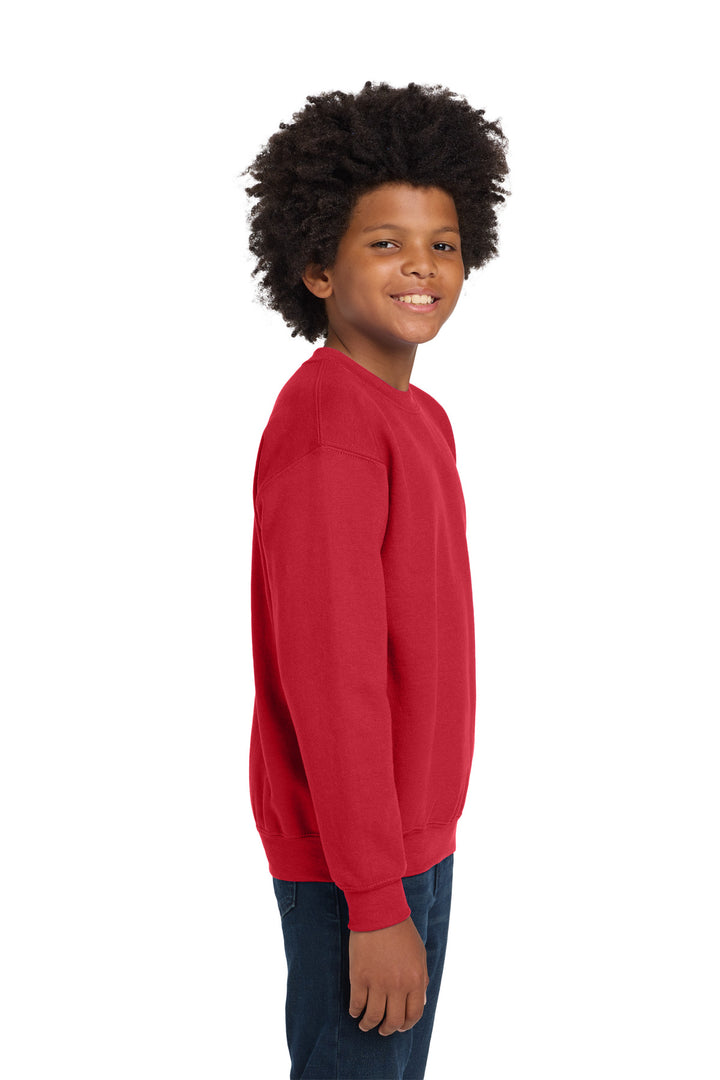 Red Gildan Youth Heavy Blend Crewneck Sweatshirt. 18000B